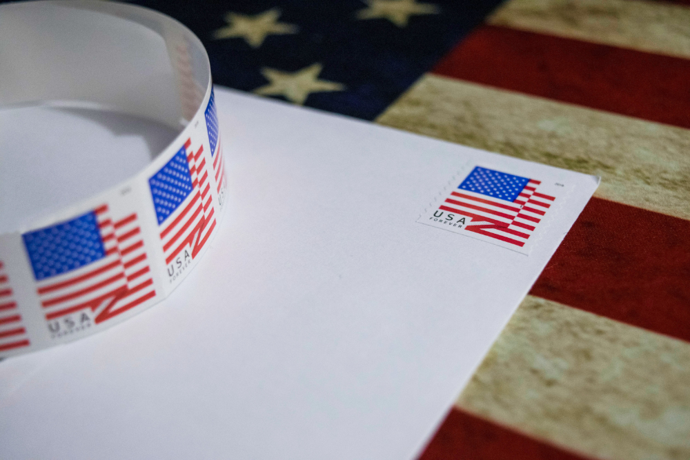 What should marketers do when postage rates increase?